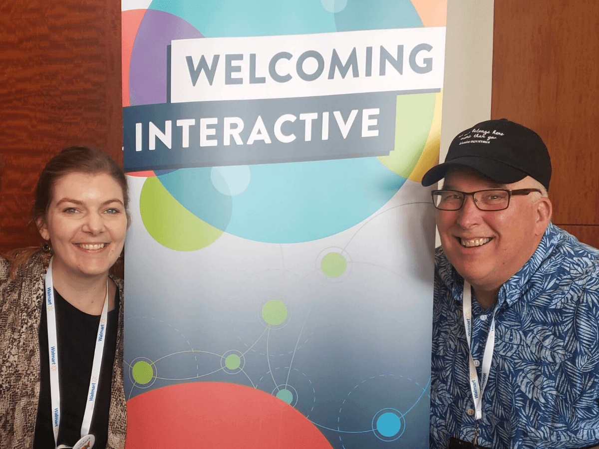Celeste and Rick with Welcoming Interactive Sign