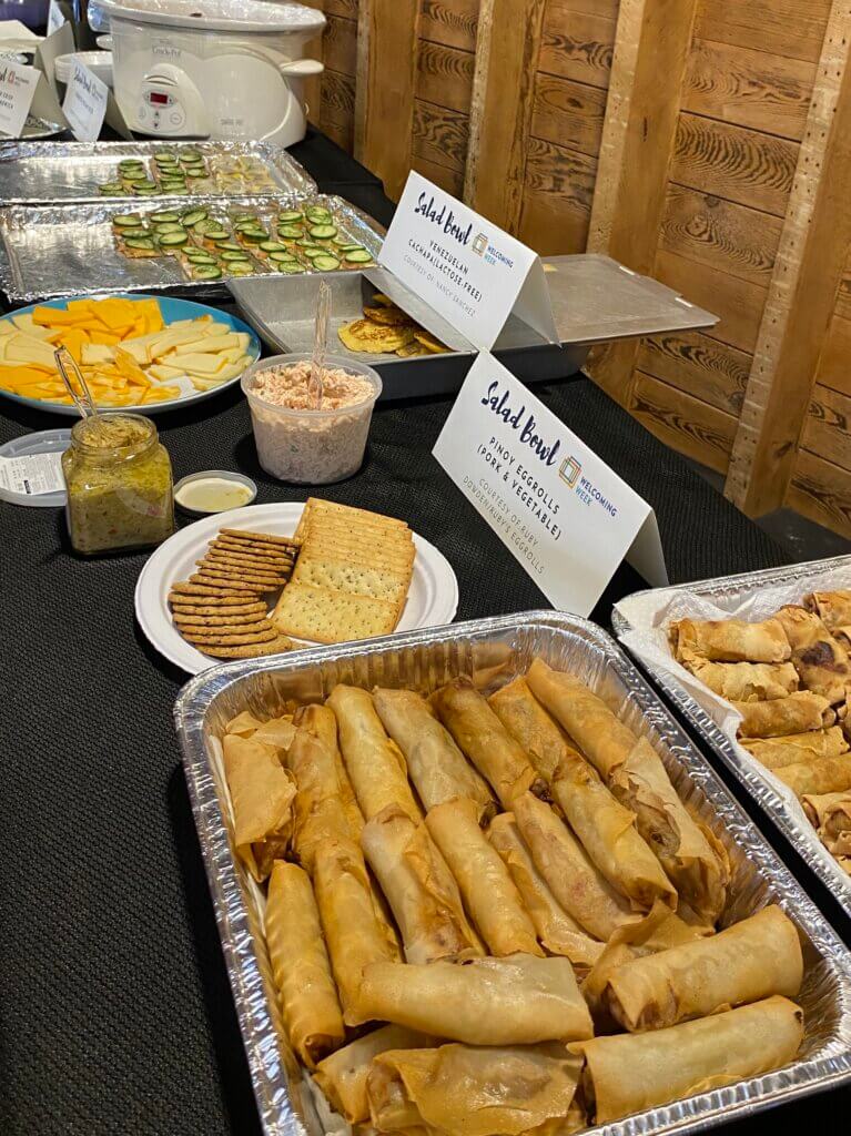 A table full of different cultural dishes.