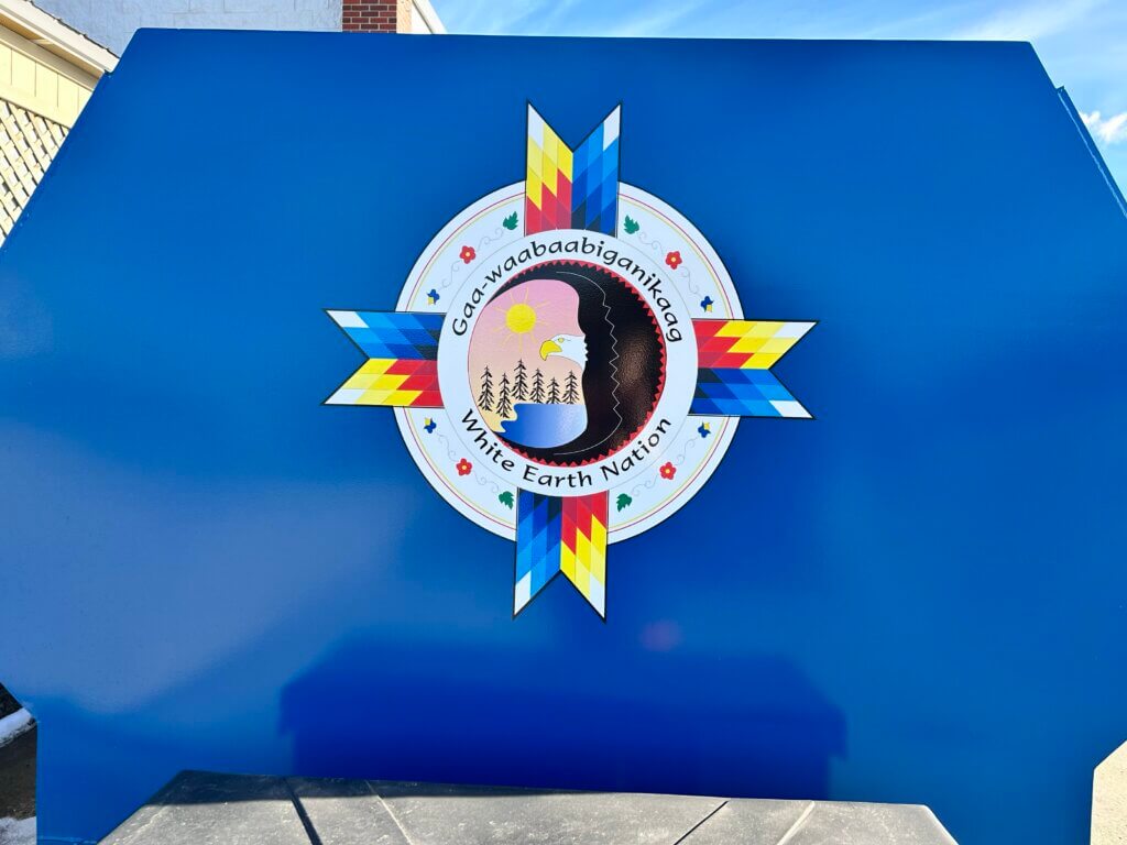 White Earth Nation Logo on the front of a recycling trailer