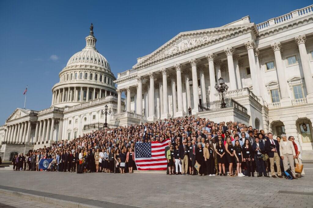 Group of lobbyist in front of capital building