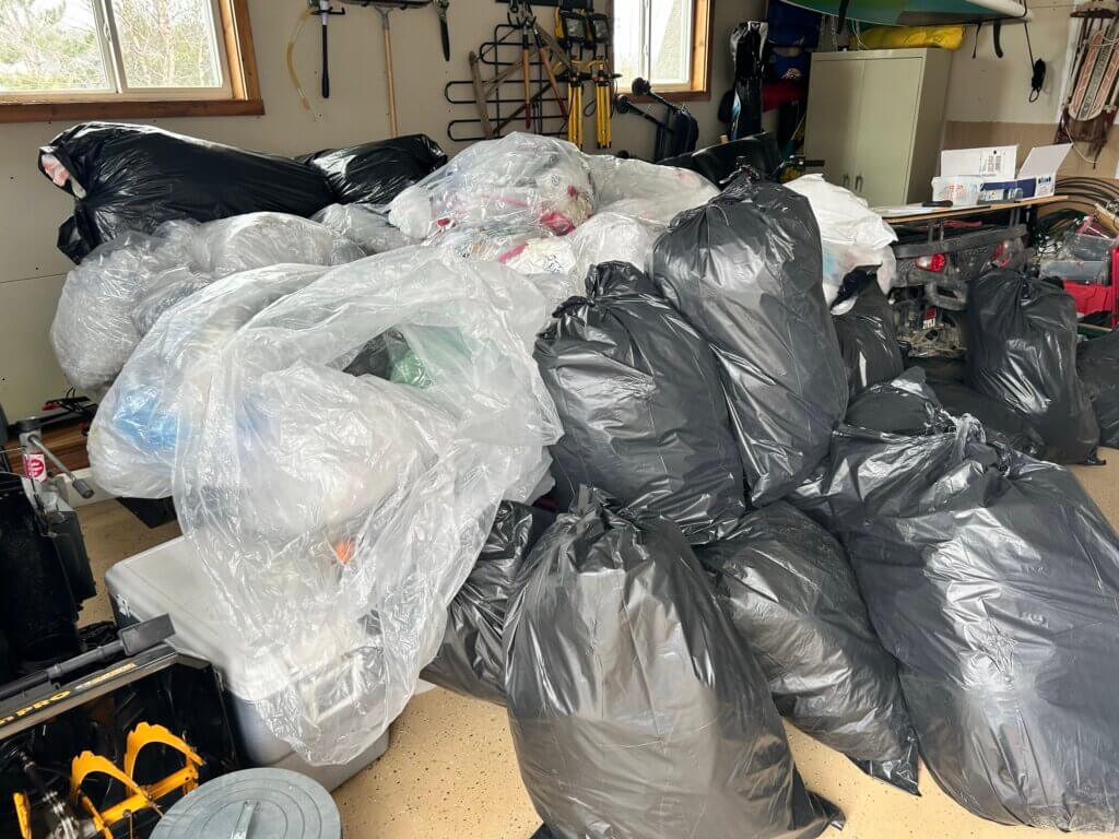 Pile of bags full of plastic ready to be recycled.