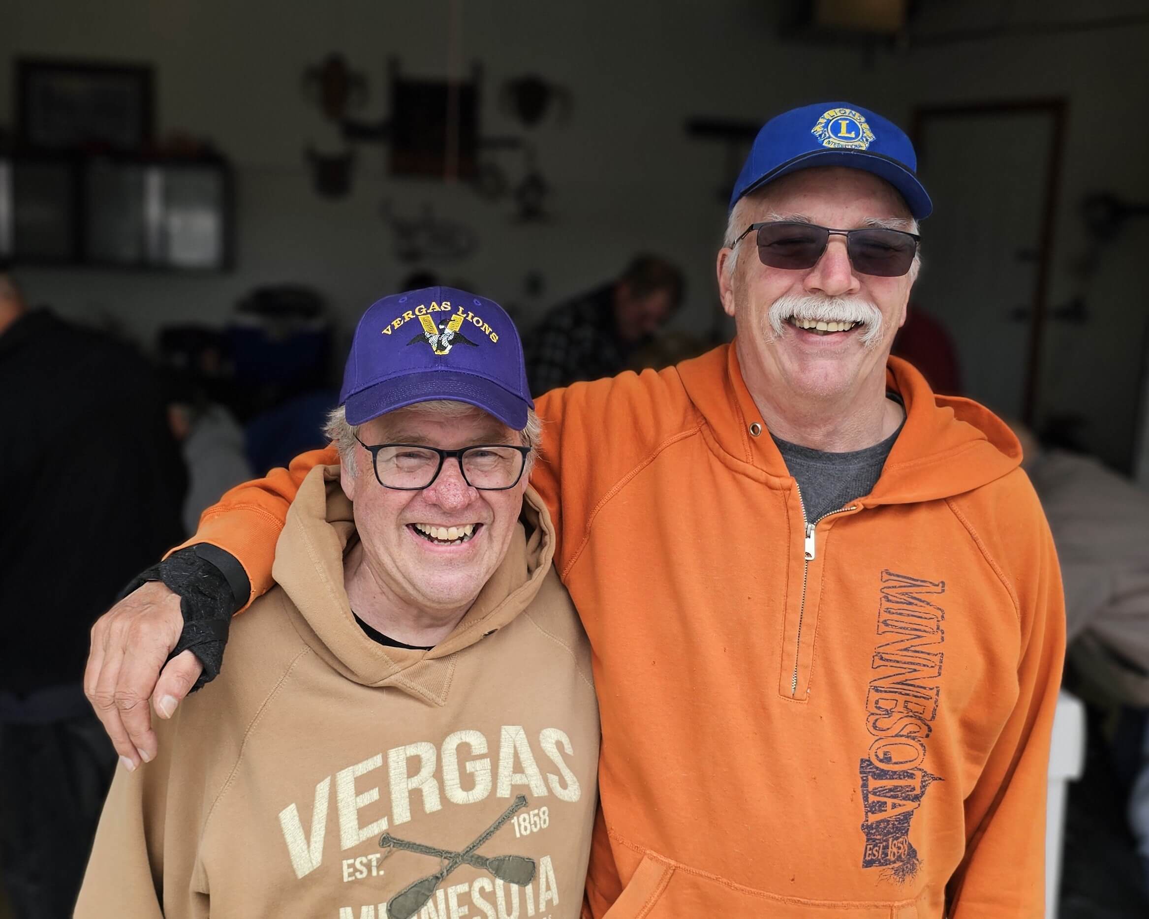 Jake Jacoby and Dennis Martinson smiling together.