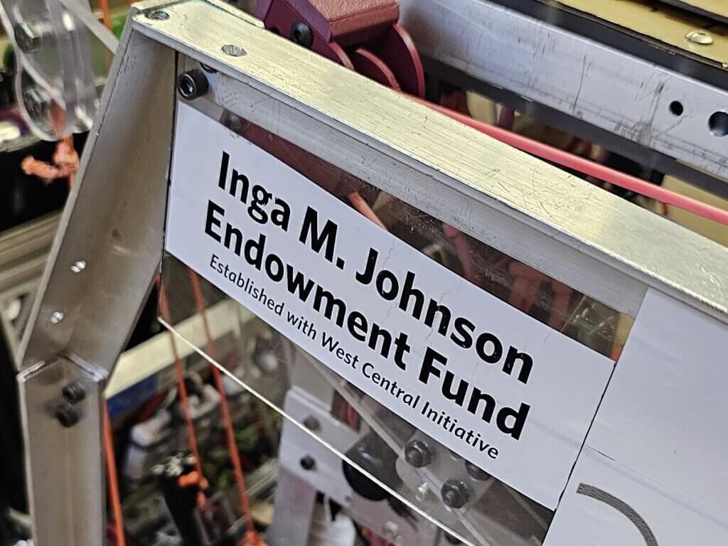 Inga M Johnson Endowment fund label on the OtterBots robot